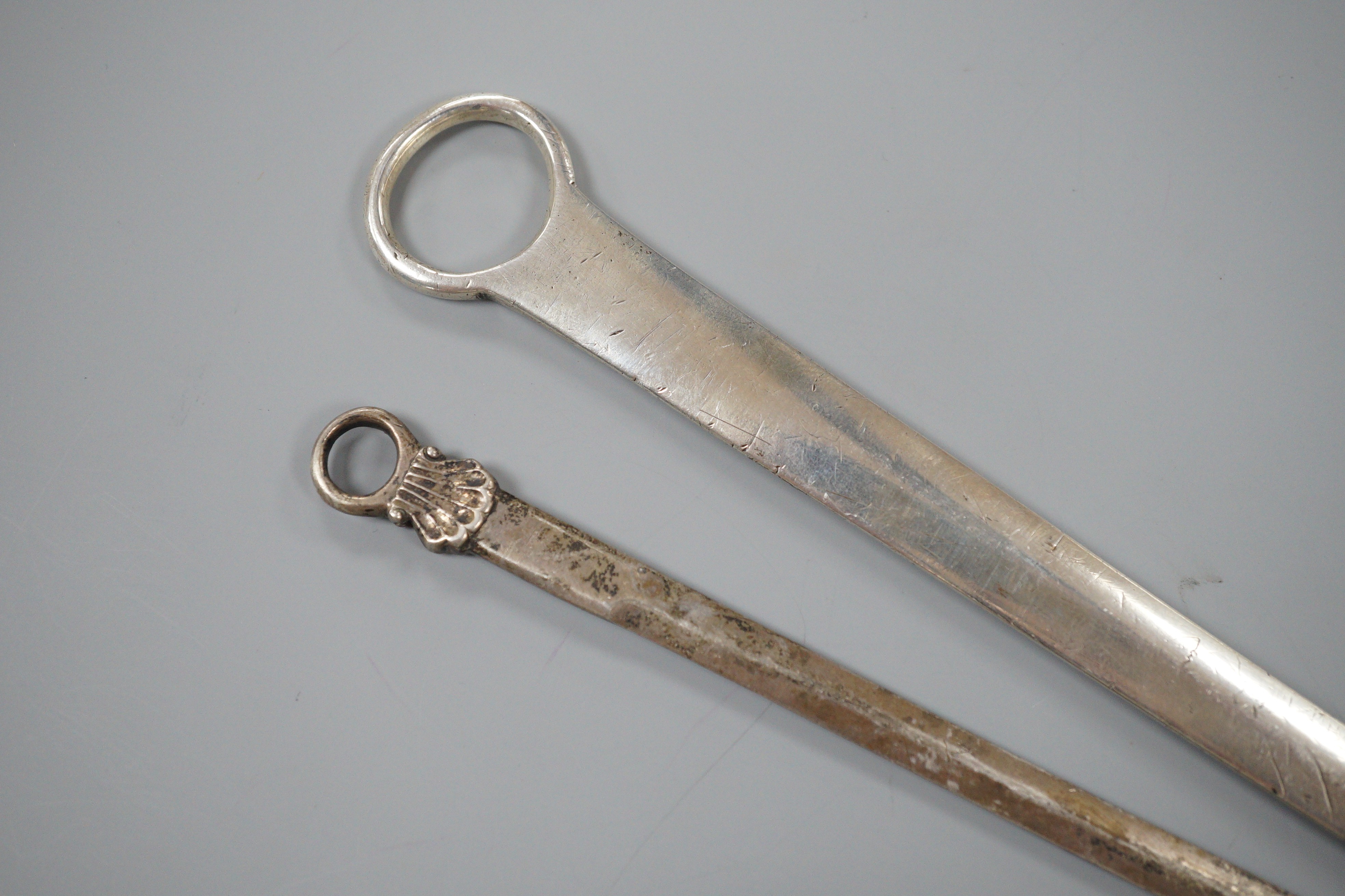 A George III silver meat skewer, Smith & Fearn, London, 1787, 32.7cm, together with a later game skewer, Eley, Fearn & Chawner, London, 1808.